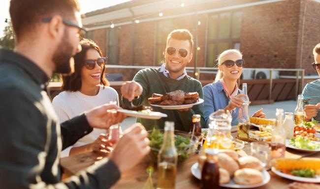 a group of people eating at a table